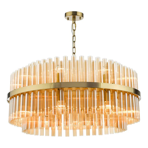 A modern chandelier with a gold frame, featuring two circular tiers of vertical, cylindrical glass rods. The chandelier hangs from a gold chain and canopy, and multiple light bulbs inside create a warm, elegant glow through the glass.
